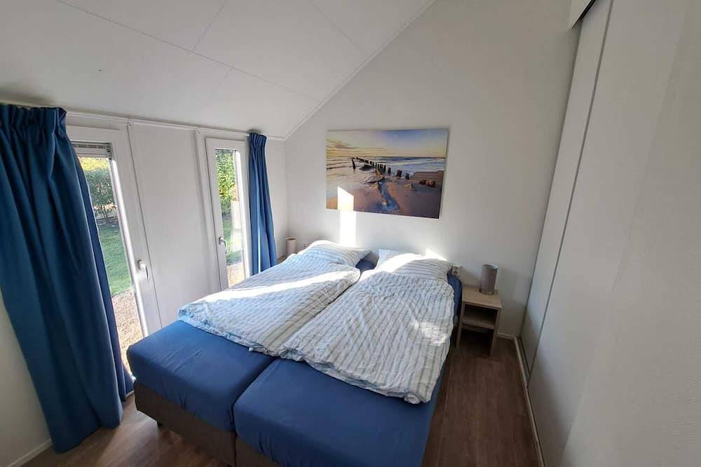Holland Beachhouse - Modernes Ferienhaus mit Garten, Wasserterrasse. in Veluwe