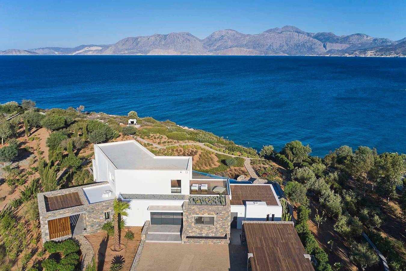 Wonderful  Crete Villa | Seafront Villa Seraphis | 6 Bedrooms | Private Heated Pool | Fitness Area & Cinema Room | Outdoor Dining Area & Bbq | Direct Access to Rocky Beach | Agios Nikolaos in Almyros Beach (Agios Nikolaos), Lasithi