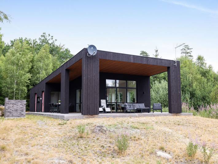 Ferienhaus für 6 Personen, mit Terrasse und Sauna sowie Seeblick