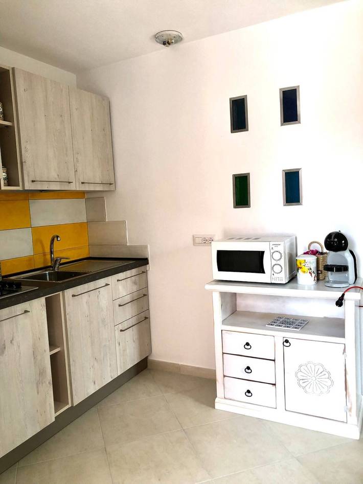 Apartamento vacacional entero, Apartamento de vacaciones para 6 personas con terraza in Isola Rossa, Trinità d'Agultu e Vignola