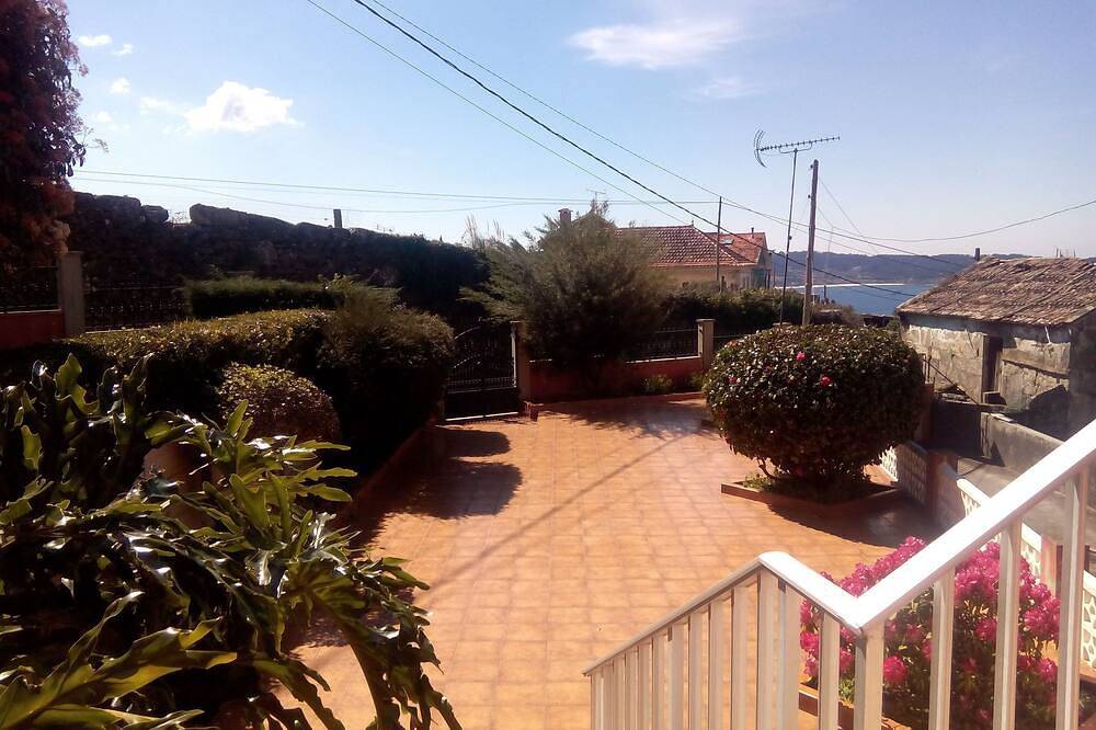 House overlooking the sea: Ria de Aldan, Ons Islands. in Galician Coast