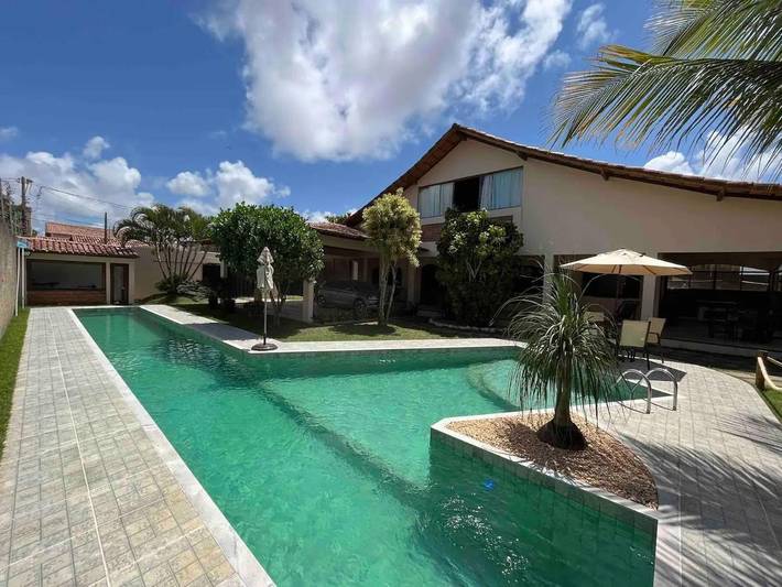 Casas e apartamentos de temporada para 20 pessoas, com piscina e vista e ainda jardim and sauna em Guriri