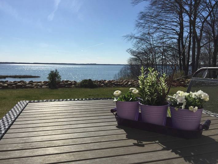 Ferienwohnung für 4 Personen, mit Terrasse und Garten sowie Seeblick und Ausblick in Waren (Müritz)