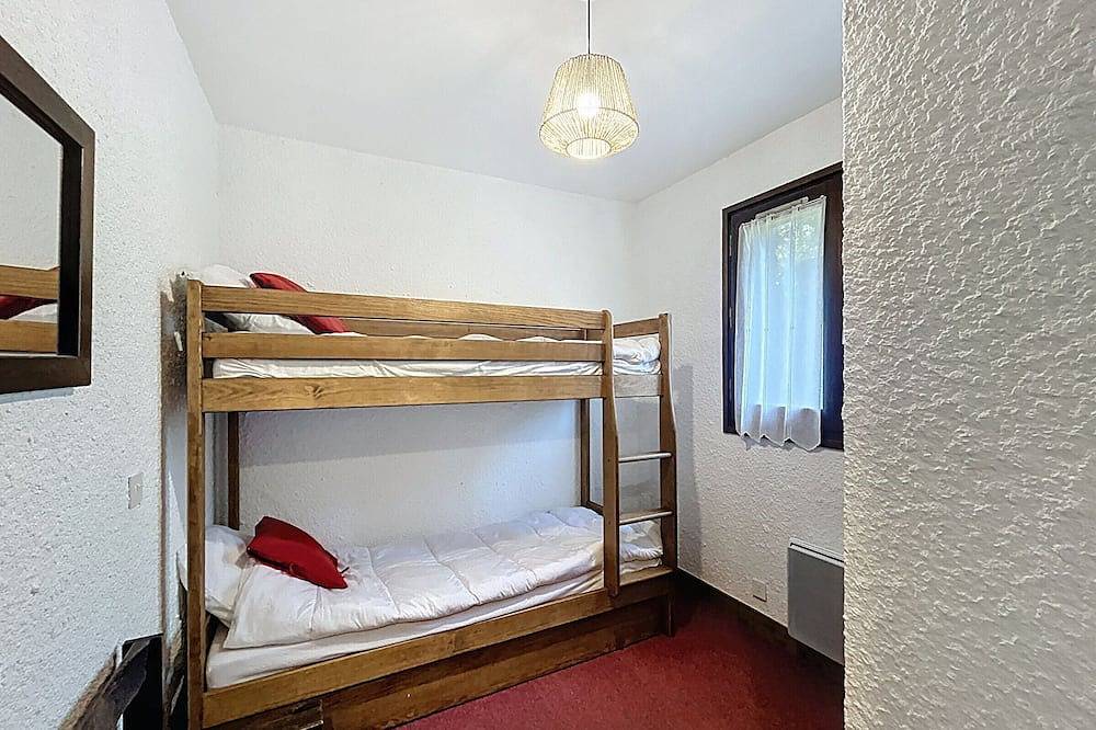 Entire apartment, Cozy 3-room apartment with fireplace and covered parking at the foot of the slopes in Combloux in Combloux, Pays du Mont-Blanc