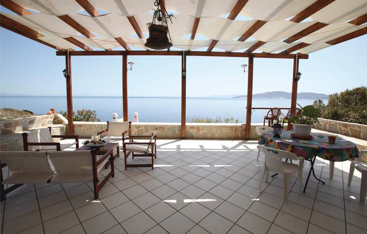 Accogliente appartamento sulla spiaggia con terrazza e aria condizionata in East coast of the Attika region