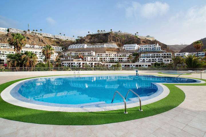 Apartamento entero, Apartamento de vacaciones 'Residencial Sol Suite 2' con vistas al mar, piscina compartida y Wi-Fi in Puerto Rico (Gran Canaria), Mogán