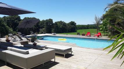 Cottage pour 4 personnes, avec jacuzzi ainsi que jardin et piscine à Peyrehorade