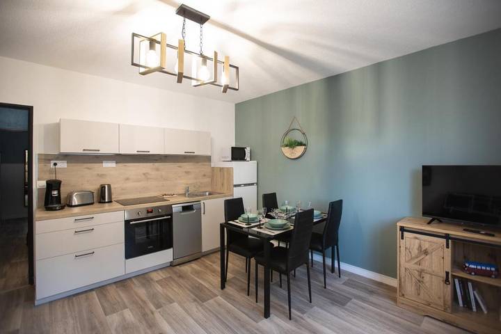 Appartement de vacances pour 4 personnes, avec Jardin ainsi que Piscine et Vue