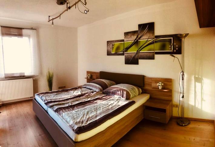 Ferienwohnung für 3 Personen, mit Terrasse und Garten sowie Ausblick