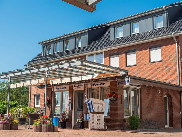 Ferienwohnung mit Meerblick für 2 Personen, mit Balkon und Garten in Schillig