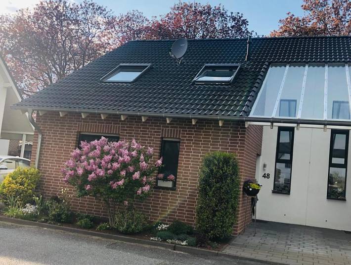 Ferienhaus für 4 Personen, mit Terrasse und Garten sowie Seeblick und Ausblick