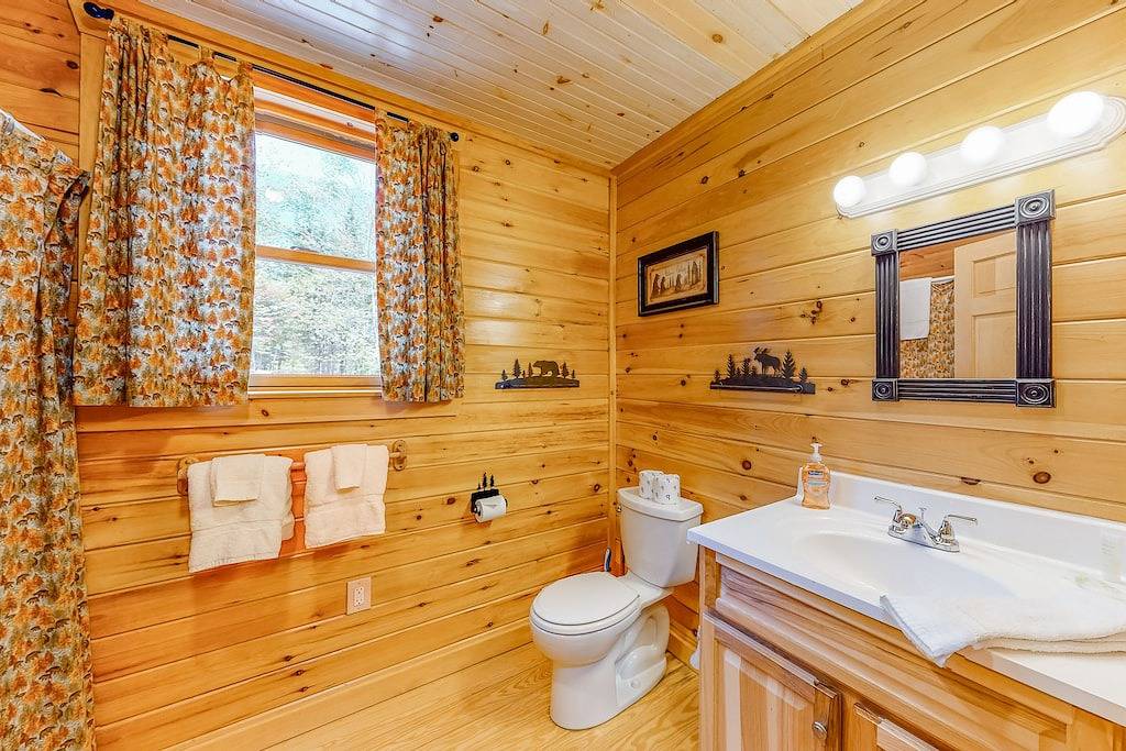 Acre waterfront hideaway with kayak, private dock on Prong Pond & firepit in Moosehead Lake