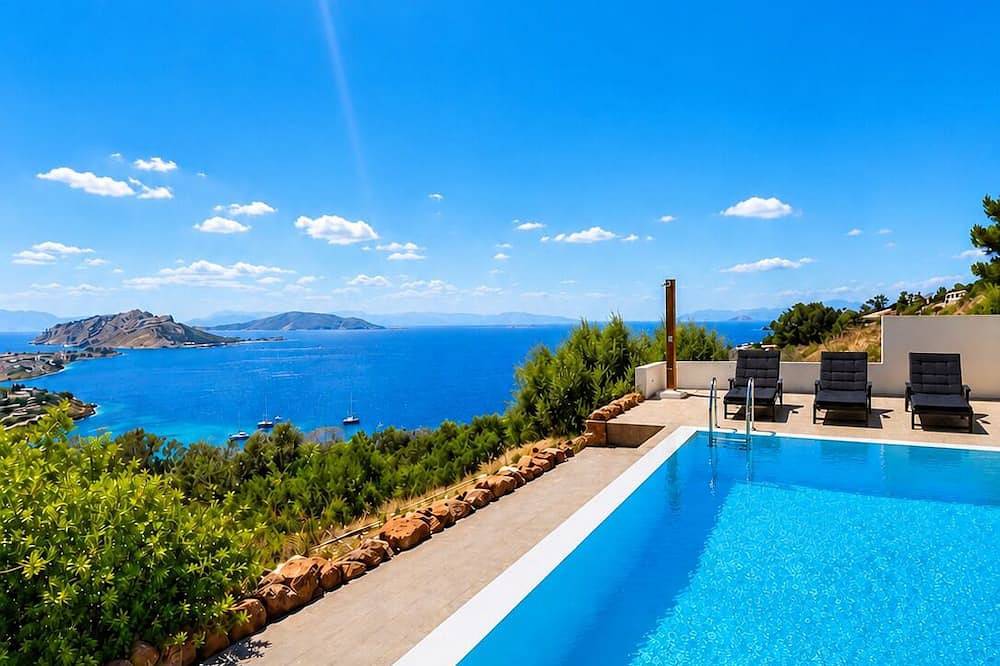 Ganze Wohnung, Minimalist, new condo with beautiful sea and mountain views in Perdika, Ägina