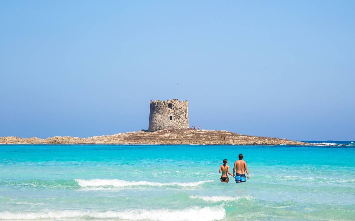 Apartamento entero, Apartamento 'Casa Vacanze Il Girasole A Stintino' con vistas al mar, balcón y aire acondicionado in Stintino, Provincia De Sassari