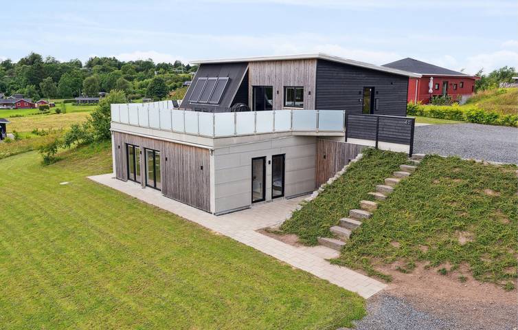 Ferienhaus für 12 Personen, mit Terrasse und Garten sowie Sauna in Hostrup Strand