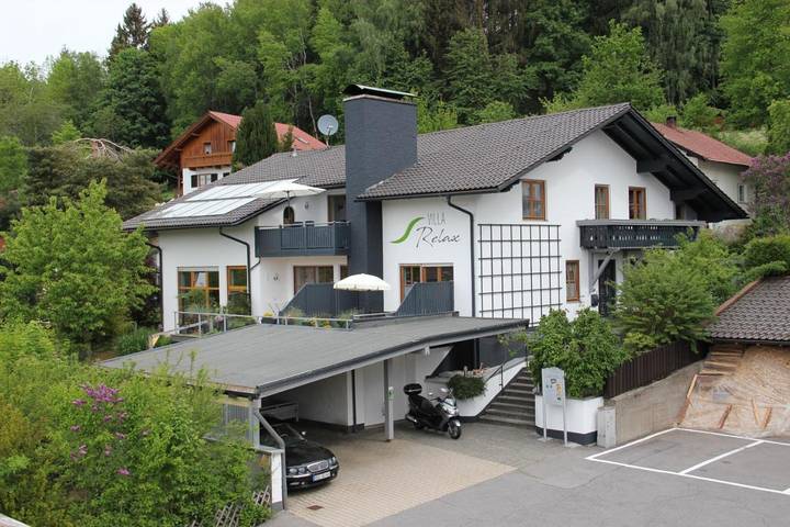 Ferienwohnung für 2 Personen, mit Terrasse und Garten sowie Pool und Sauna
