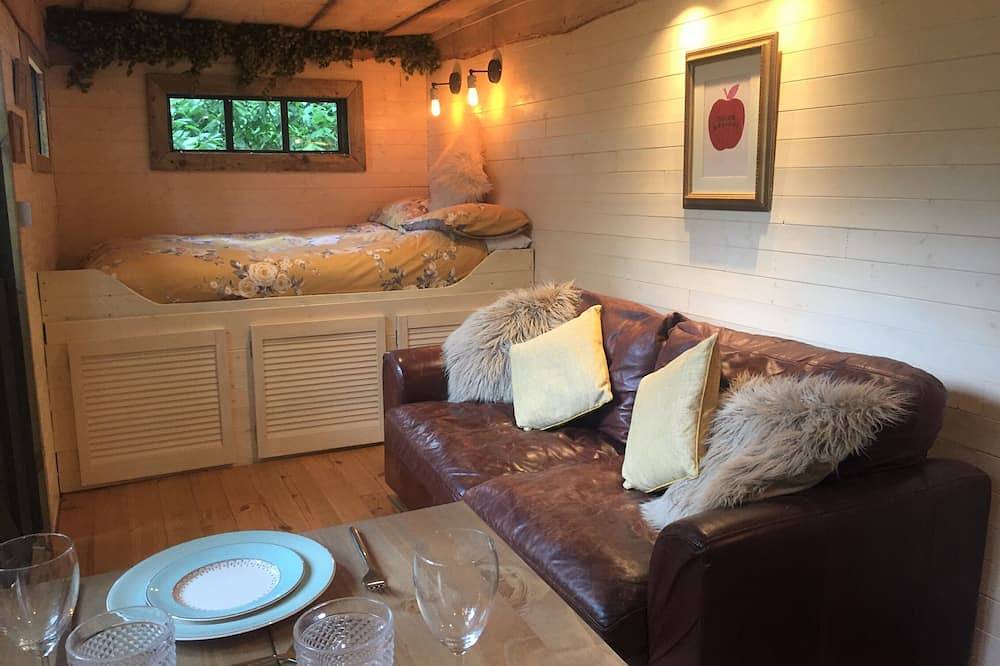 Unique and Bespoke Stunning Thatched Dorset Shepherds Huts with Private Hot Tub in Dorset