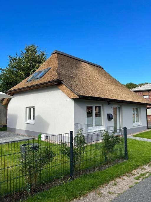 Ferienwohnung für 4 Personen, mit Terrasse und Garten sowie Ausblick in Delve