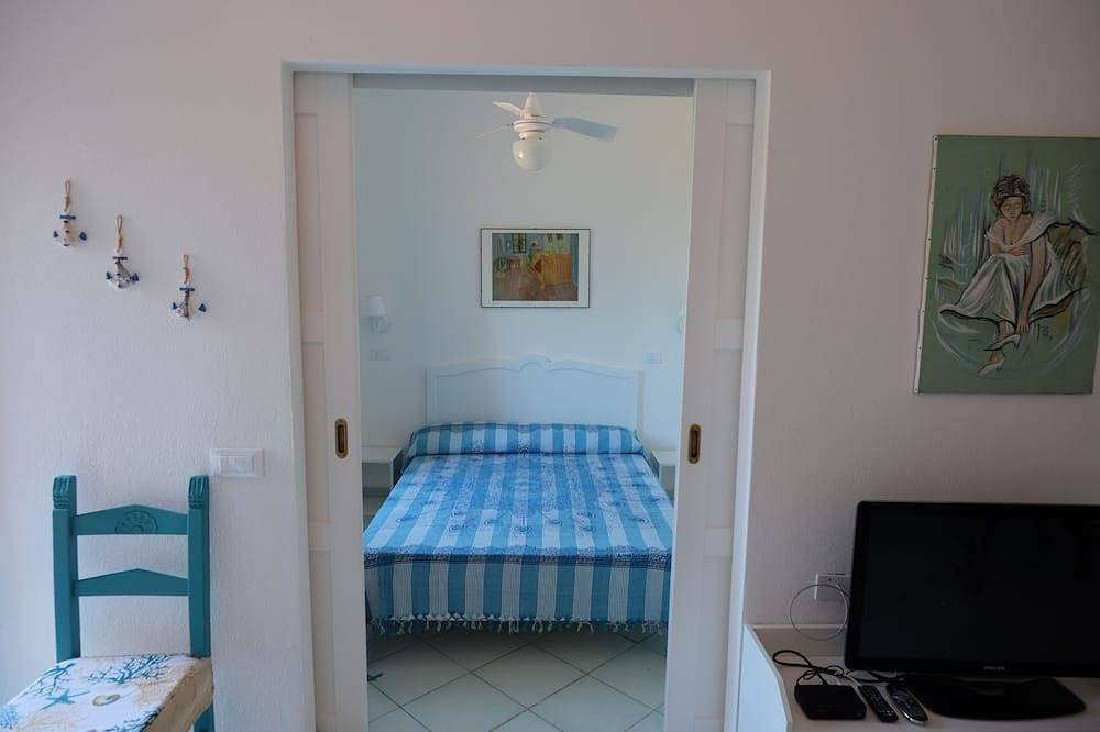 Appartamento intero, Appartamento al Villaggio di Calarossa - trilocale per 4 persone pet friendly in La Marinedda, Trinità d'Agultu e Vignola