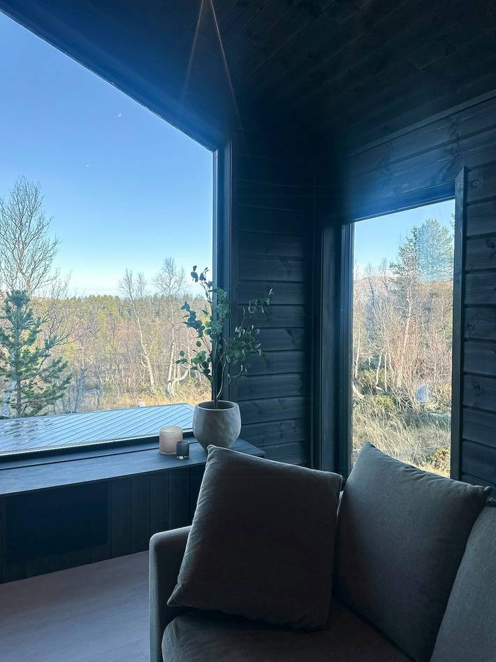 Idyllische Hütte mit Panoramablick auf die Berge in Rennebu