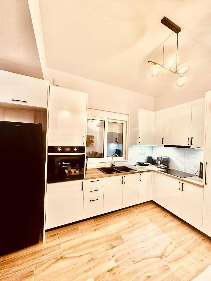 Ferienwohnung für 4 Personen, mit Balkon und Terrasse sowie Garten in Gythio