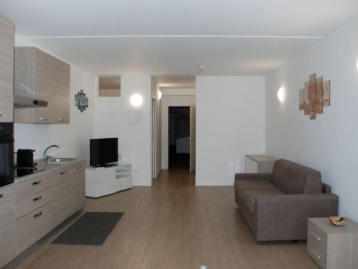 Appartement de vacances pour 4 personnes, avec bassin pour enfant ainsi que jardin et vue
