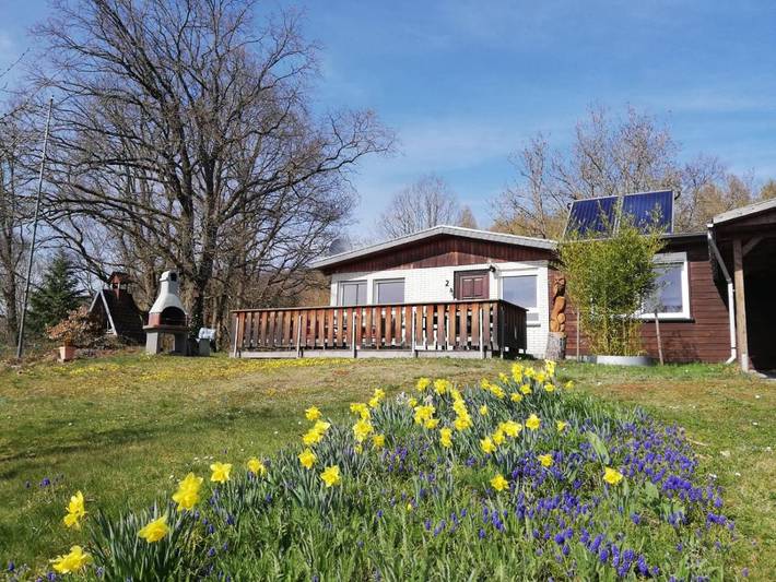 Ferienhaus für 4 Personen, mit Balkon und Terrasse sowie Garten und Sauna