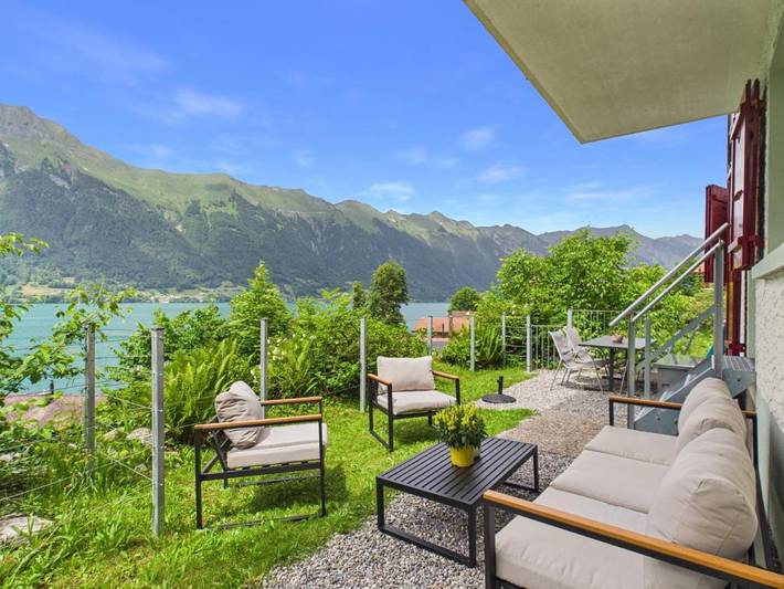 Ferienwohnung für 5 Personen, mit Terrasse und Garten sowie Seeblick und Ausblick in Iseltwald