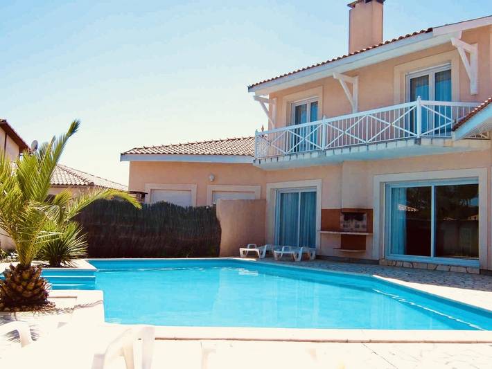 Villa pour 12 personnes, avec Balcon ainsi que Terrasse et Jardin à Biscarrosse