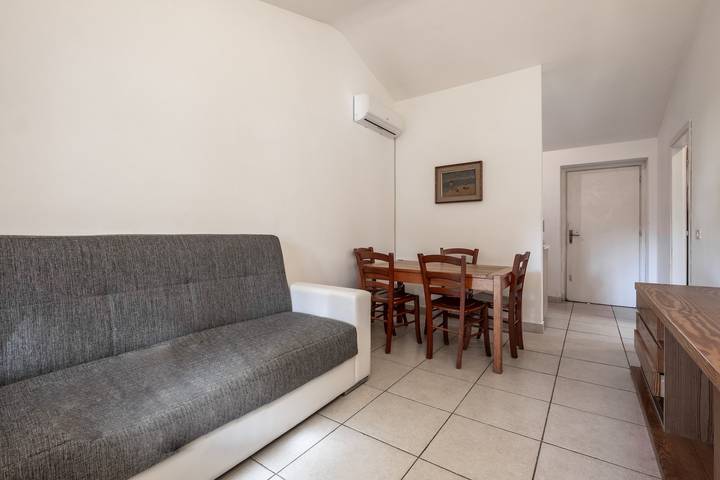 Entire apartment, Apartment 'La Capannuccia B' with Shared Garden, Wi-Fi, and Air Conditioning in Al Cartello, Orbetello