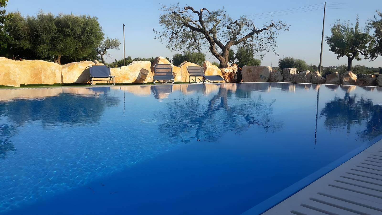 Appartamento intero, Appartamento 'Trullo Country Relax Lumieri 4' con piscina condivisa, Wi-Fi e aria condizionata in Martina Franca, Provincia di Bari