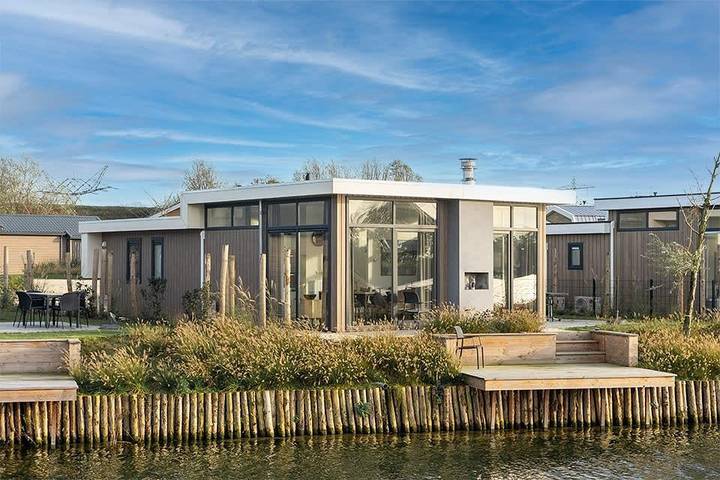 Ferienhaus für 8 Personen, mit Balkon/Terrasse und Terrasse sowie Garten