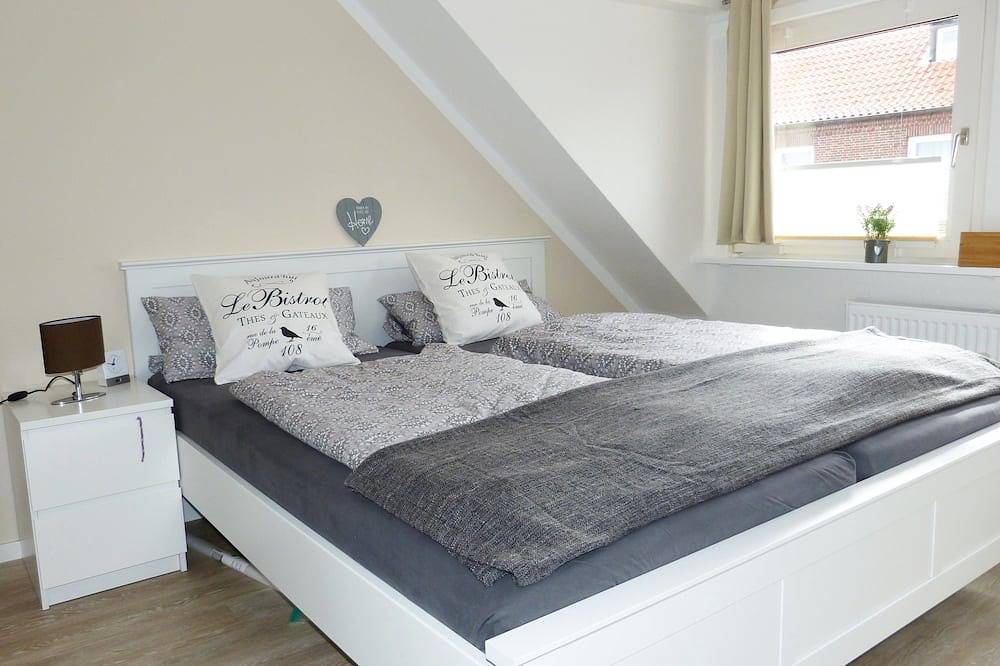Ganze Wohnung, Sonnendurchflutete Ferienwohnung mit Mini-Meerblick im schönen Ostdorf in Juist