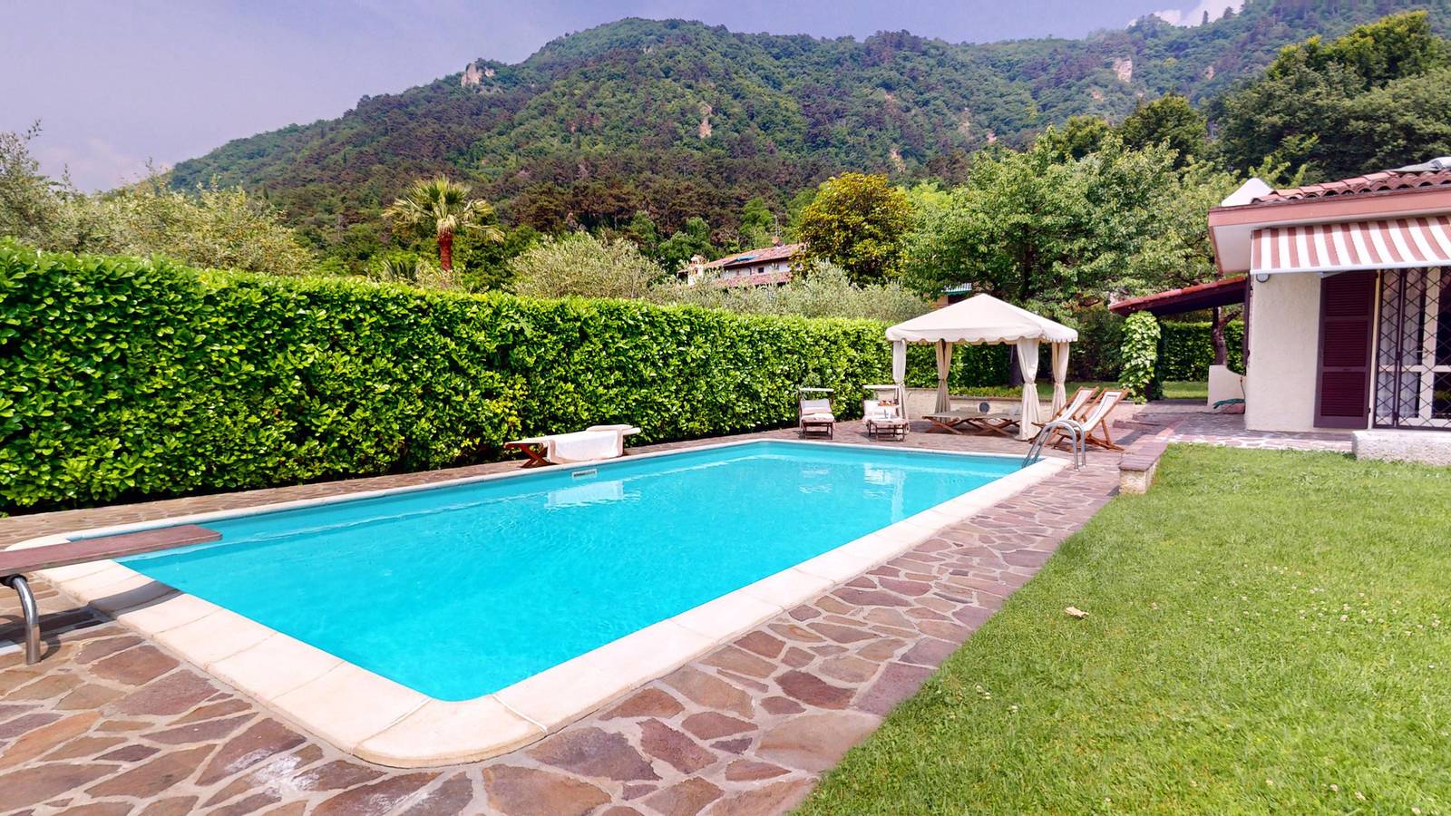 Villa Oleandri pool with view in Saló, Montañas Garda