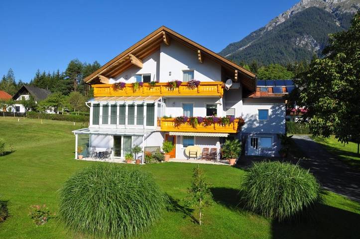 Ferienwohnung für 3 Personen, mit Terrasse und Garten sowie Seeblick am Pressegger See