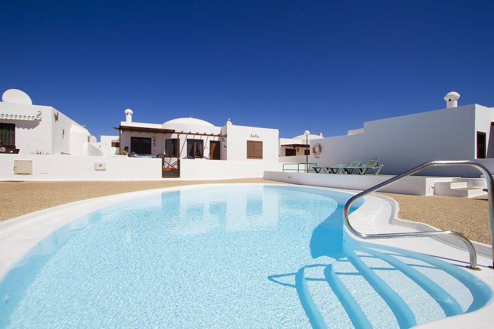 La villa se encuentra magníficamente en un complejo pequeño in Puerto del Carmen, Tías