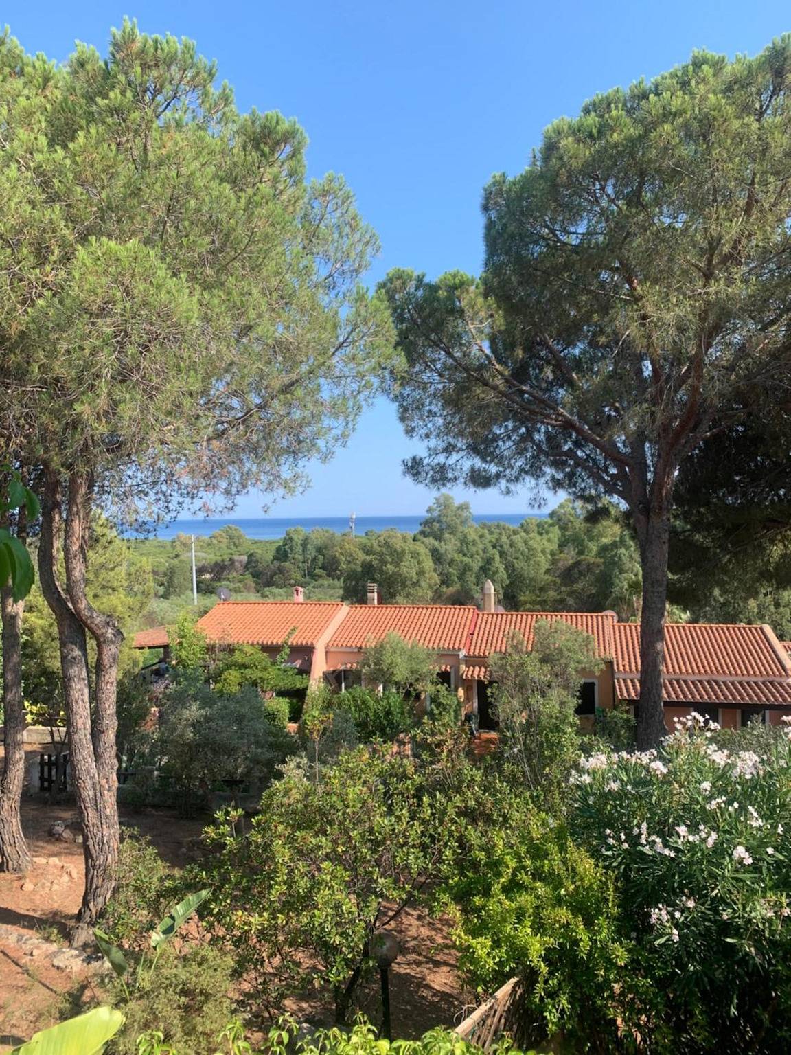 Apartamento entero, Apartamento 'Villa Marina' con vistas al mar, piscina compartida y aire acondicionado in Santa Margherita di Pula, Región de Pula