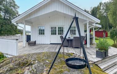 Ferienhaus für 4 Personen, mit Seeblick und Terrasse sowie Garten in Süd-Norwegen