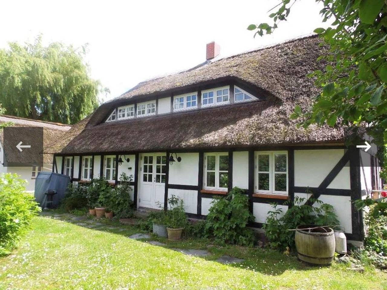 Ganze Ferienwohnung, Ferienhaus Boddenblick unterm Reetdach mit Kamin und Sauna in Gager, Mönchgut
