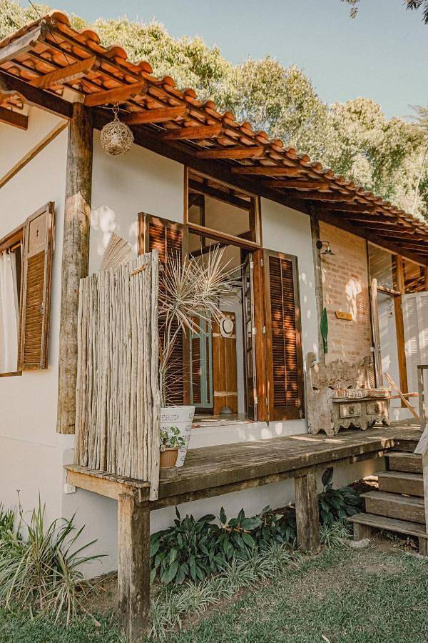 Casas e apartamentos de temporada para 2 pessoas, com vista e jardim em Veloso (Ilhabela)