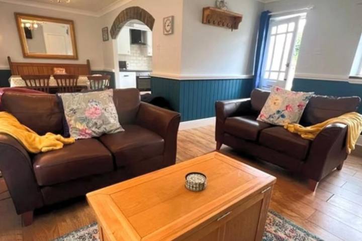 Holiday rental for 6 people, with ocean view and balcony as well as garden, child-friendly in Ceredigion