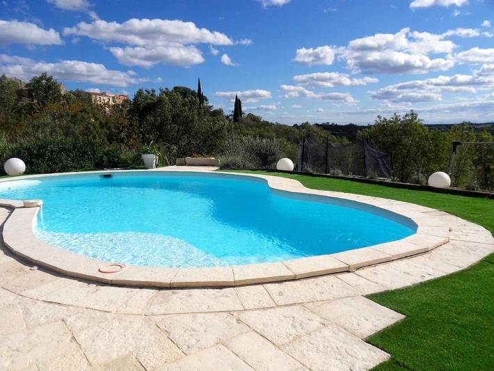 Location de vacances pour 9 personnes, avec piscine ainsi que vue et jardin à Autignac - 2