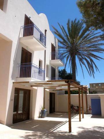 Cottage pour 2 personnes, avec jardin et vue, adapté aux familles à Favignana