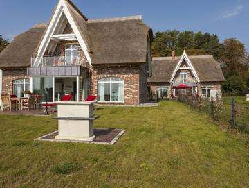 Ferienhaus für 6 Personen, mit Balkon und Sauna sowie Garten, kinderfreundlich in Putbus