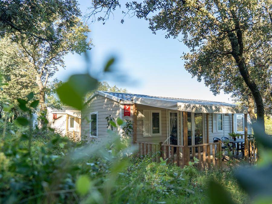 Camping Mer et Camargue - Mobilhome 4 personnes - 2 ch 4 pers Terrasse semi-couverte in Calvisson, Région de Nîmes