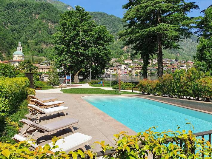 Gîte pour 4 personnes, avec terrasse et piscine ainsi que jardin et vue sur le lac, animaux acceptés dans Riva San Vitale
