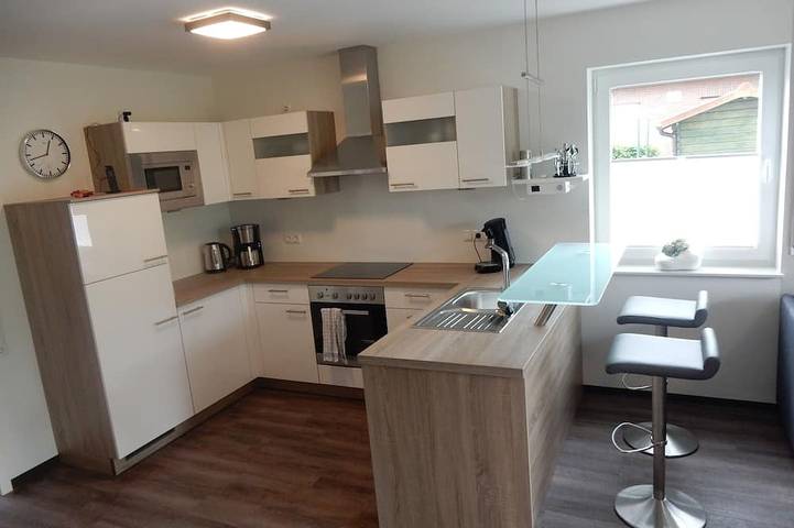 Ferienhaus für 4 Personen, mit Balkon und Garten