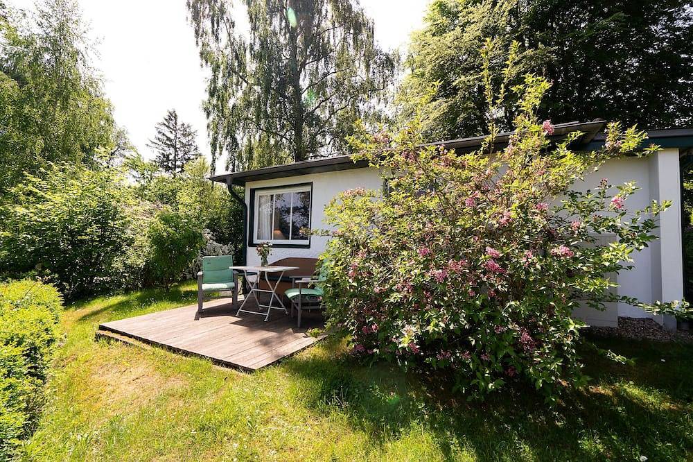 Ferienhäuschen „Koboldshütte“ am Kleinen Pönitzer See mit eigener Terrasse in Pönitzer See, Scharbeutz