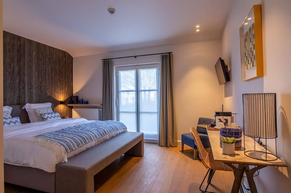 Gezellige hoeve voor 30 personen met binnenzwembad, infraroodsauna, speelplein. in West-Vlaanderen