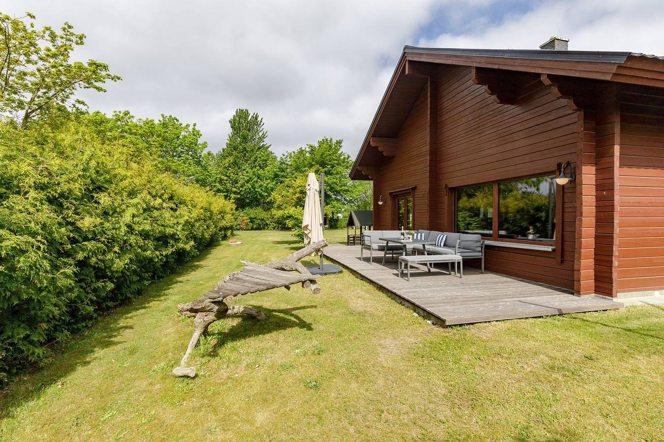 Finnischer Blockhaustraum mit großem umzäunten Garten und Sauna. in Rerik, Neubukow-Salzhaff